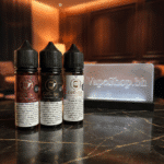Captain Gold E-Liquids Freebase lifestyle shot, vape freebase bottle on clean surface