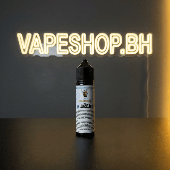 Top-view of mood freebase e-liquid bottle in bahrain, glossy surface and key vape details.