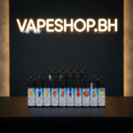 Mega Freebase from Grand E-Liquids, eye-popping label on ergonomic vape juice bottle.