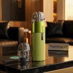 Vaporesso Luxe Q2 pod system showing COREX 0.6Ω mesh coil pod, auto-draw activated, premium Bahrain vape kit with Type-C port