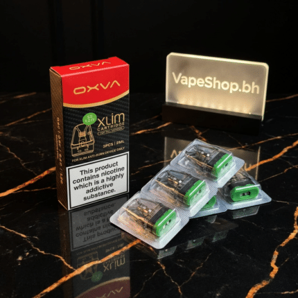Closeup of OXVA XLIM SS pod, transparent window showing e-liquid, magnetic connector, vape Bahrain