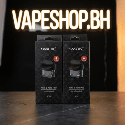 Close-up of **Smok Nord 2** pod system showing side-fill 4.5ml RPM pod, adjustable 40W button, and zinc alloy body in Bahrain vape shop.