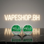 Close-up of VELO nicotine pouches tin with fruit flavor vibrant hues, 9mg strong slim pouches, Bahrain vape alternative.