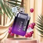 Close-up of Mazaj Infinity X 9000 puff vape showing battery screen, Type-C port, compact ergonomic shape.