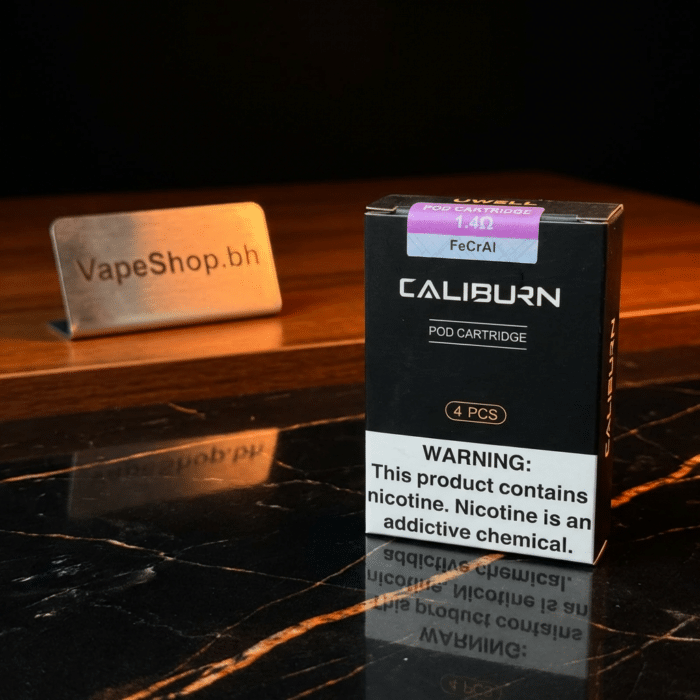 Close-up of uwell caliburn koko pod showing 2ml top-fill system and 1. 0ω coil for smooth mtl vaping in bahrain.