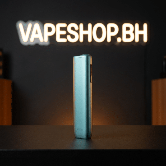 Green iqos iluma i with open case, usb-c port visible, reliable heated tobacco in bahrain.