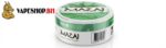Single Mazaj pouch pulled from tin, smooth white texture visible, discreet nicotine option Bahrain
