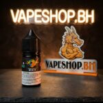 TRAND Saltnic e-liquid bottle in sharp focus against plain backdrop for Bahrain shoppers