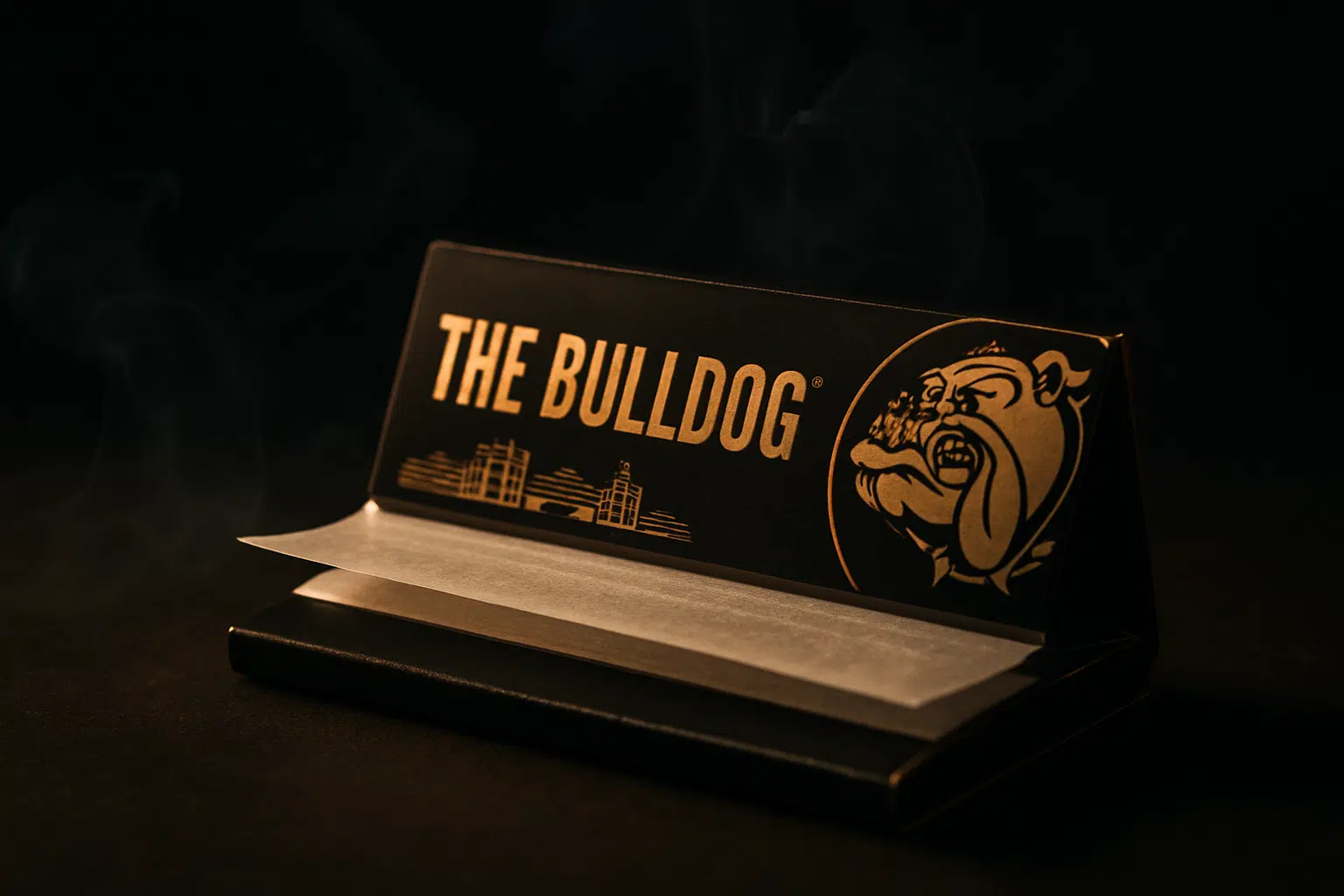 Bulldog rolling paper hero image showcasing amsterdam icon booklet with slow-burning papers and dramatic vapor wisps