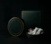 Snus in Bahrain hero image showing sealed snus and nicotine pouches in a dramatic studio setup